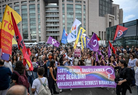 People gather outside Istanbul's courthouse behind a banner reading "Being LGBT+ and organising are not a crime. Turkish police arrested dozens of people on September 13 in gay bars and at the homes of LGBTQ activists on charges including "obscenity", "assisting prostitution" and having "financial links abroad". Authorities have blocked social media accounts belonging to human rights defenders and media outlets as part of operations dubbed "My Family Is Safe."